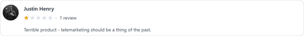 One-star customer review from Justin Henry mentioning poor experience and criticizing telemarketing compared to an AI phone answering system.